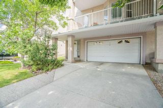 Photo 3: 305 Sierra Morena Green SW in Calgary: Signal Hill Row/Townhouse for sale : MLS®# A2067886