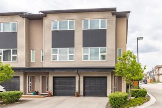 Photo 32: 404 Covecreek Circle NE in Calgary: Coventry Hills Row/Townhouse for sale : MLS®# A1217696