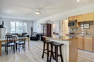 Photo 2: 401 8000 Wentworth Drive SW in Calgary: West Springs Row/Townhouse for sale : MLS®# A1148308