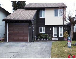 Photo 1: 7377 PARKWOOD Drive in Surrey: West Newton House for sale : MLS®# F2803343