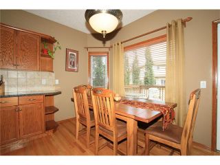 Photo 11: 18 WEST POINTE Manor: Cochrane House for sale : MLS®# C4072318