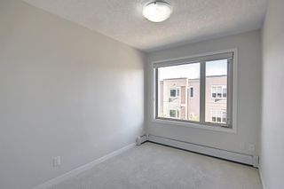Photo 25: 202 7 Westpark Common SW in Calgary: West Springs Apartment for sale : MLS®# A2006714
