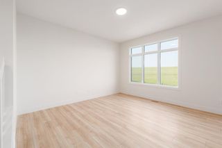 Photo 18: 102 Sundown Close: Cochrane Semi Detached (Half Duplex) for sale : MLS®# A2070990