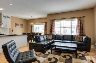 Photo 4: 273 Cougartown Circle SW in Calgary: Cougar Ridge Detached for sale : MLS®# A2127898