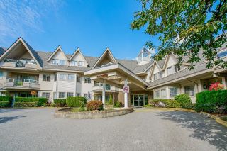 Photo 1: 201 19241 FORD ROAD in Pitt Meadows: Central Meadows Condo for sale : MLS®# R2623936