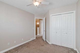 Photo 14: 21 Crystal Shores Cove: Okotoks Row/Townhouse for sale : MLS®# A2126777