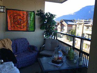 Photo 3: 211 1211 VILLAGE GREEN Way in Squamish: Downtown SQ Condo for sale in "ROCKCLIFFE" : MLS®# V1097471