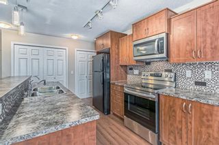 Photo 2: 2231 700 Willowbrook Road NW: Airdrie Apartment for sale : MLS®# A2020472