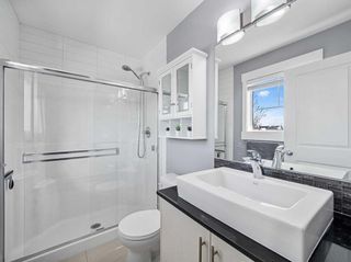 Photo 26: 7 West Coach Manor SW in Calgary: West Springs Row/Townhouse for sale : MLS®# A2129977