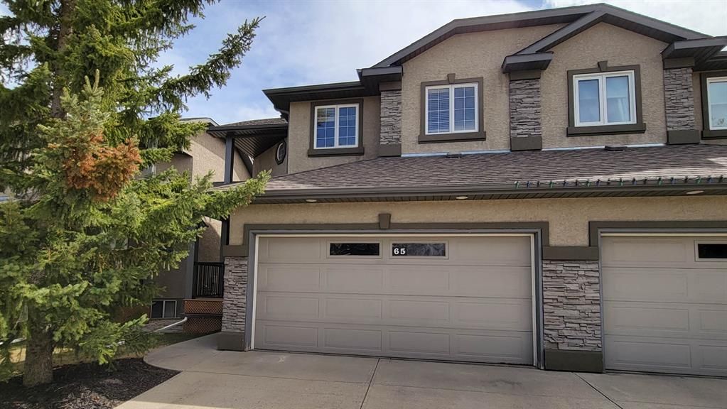 Main Photo: 65 Prominence Park SW in Calgary: Patterson Semi Detached for sale : MLS®# A1220013