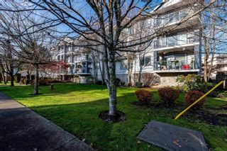 Photo 1: 317 20177 54A Avenue in Langley: Langley City Condo for sale in "STONEGATE" : MLS®# R2661364