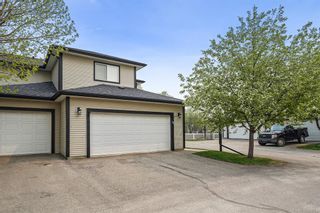 Photo 1: 11 15 Silver Springs Way NW: Airdrie Row/Townhouse  : MLS®# A2049148