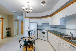 Photo 3: 319 223 Tuscany Springs Boulevard NW in Calgary: Tuscany Apartment for sale : MLS®# A2025251