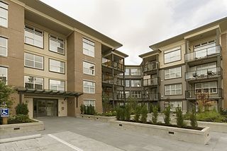 Photo 1: 416 10707 139TH Street in Surrey: Whalley Condo for sale in "Aura 2" (North Surrey)  : MLS®# F2824909