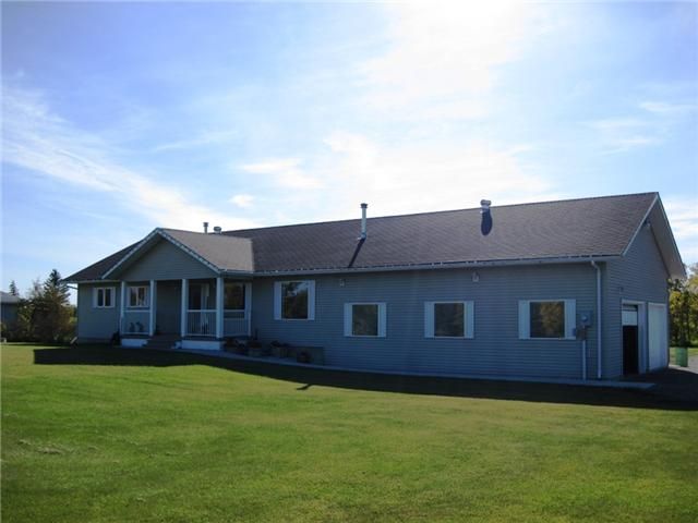 Main Photo: 12148 WEST BY PASS Road in Fort St. John: Fort St. John - Rural W 100th House for sale in "FISH CREEK" (Fort St. John (Zone 60))  : MLS®# N233953