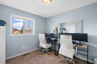 Photo 18: 31 Cougarstone Way SW in Calgary: Cougar Ridge Detached for sale : MLS®# A2129080