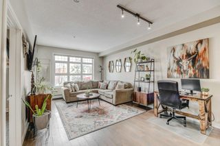 Photo 1: 217 25 Auburn Meadows Avenue SE in Calgary: Auburn Bay Apartment for sale : MLS®# A2028572