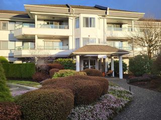 Photo 1: 212 2451 GLADWIN Road in Abbotsford: Abbotsford West Condo for sale in "Centennial Court The Cedars" : MLS®# R2846321