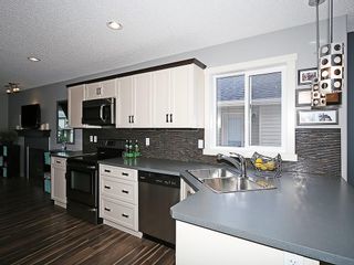 Photo 4: 1188 KINGS HEIGHTS Road SE: Airdrie House for sale : MLS®# C4125502