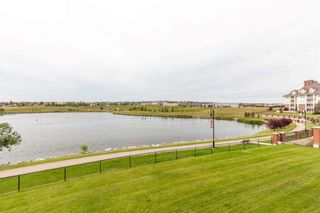 Photo 6: 603 Country Village Cape NE in Calgary: Country Hills Village Row/Townhouse for sale : MLS®# A2128754