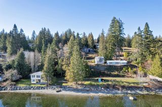 Heriot Bay oceanfront rancher, garage/suite & cabin on 1 acre, boasting an easy walk-out beach and overlooking Drew Harbour & Rebecca Spit!