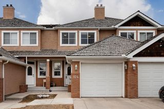 Photo 1: 124 Royal Manor NW in Calgary: Royal Oak Row/Townhouse for sale : MLS®# A2040078
