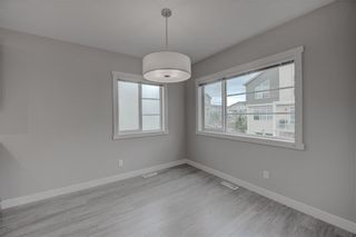 Photo 10: 405 Redstone View NE in Calgary: Redstone Row/Townhouse for sale : MLS®# A1224923