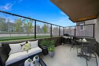 Photo 3: 105 916 Memorial Drive NW in Calgary: Sunnyside Apartment for sale : MLS®# A2036227