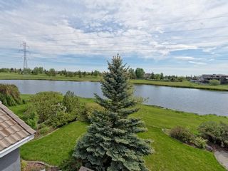 Photo 2: 167 LAKESIDE GREENS Court: Chestermere House for sale : MLS®# C4120469