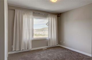 Photo 27: 102 501 RIVER HEIGHTS Drive: Cochrane Row/Townhouse for sale : MLS®# C4266118