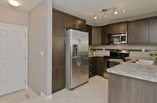 Photo 11: 3071 WINDSONG Boulevard SW: Airdrie Row/Townhouse for sale : MLS®# C4300138