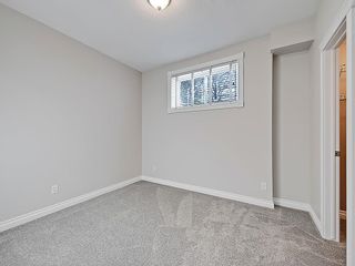 Photo 26: 302 Garrison Square SW in Calgary: Garrison Woods Row/Townhouse for sale : MLS®# C4225939