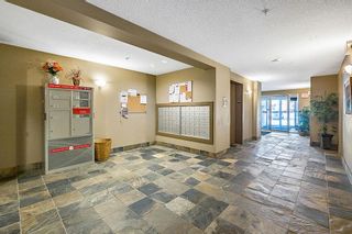 Photo 4: 2105 92 Crystal Shores Road: Okotoks Apartment for sale : MLS®# A2005622