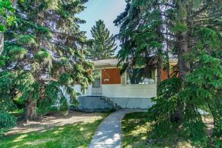 Photo 3: 5920 BUCKTHORN Road NW in Calgary: Thorncliffe Detached for sale : MLS®# C4172366