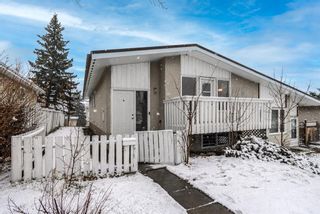 Photo 1: 7428 10 Street NW in Calgary: Huntington Hills Semi Detached for sale : MLS®# A1207637