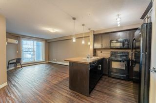 Photo 1: 2108 130 Panatella Street NW in Calgary: Panorama Hills Apartment for sale : MLS®# A2015694