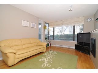 Photo 1: 305 4118 DAWSON Street in Burnaby: Brentwood Park Condo for sale in "TANDEM" (Burnaby North)  : MLS®# V942246