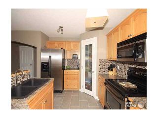 Photo 5: 60 CANOE Cove SW: Airdrie Residential Detached Single Family for sale : MLS®# C3517136