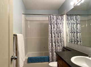 Photo 19: 47 Cougartown Close SW in Calgary: Cougar Ridge Detached for sale : MLS®# A1105969