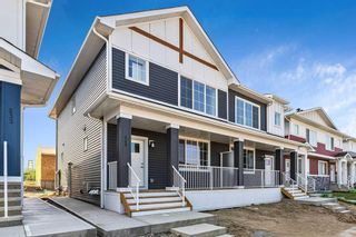 Photo 1: 233 & 237, 225 & 229 Creekside Drive SW in Calgary: C-168 Full Duplex for sale : MLS®# A2145172