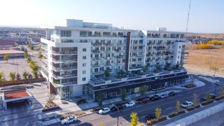 Photo 2: 516 8505 Broadcast Avenue SW in Calgary: West Springs Apartment for sale : MLS®# A2028519