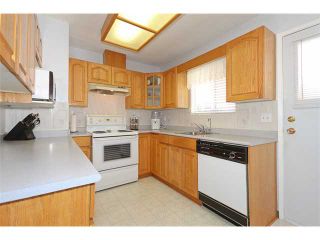 Photo 4: 2765 COAST MERIDIAN Road in Port Coquitlam: Glenwood PQ House for sale : MLS®# V862235