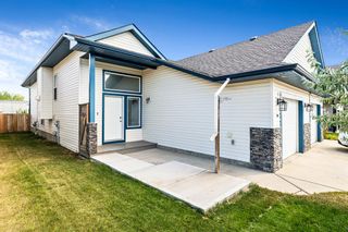 Photo 1: 740 Carriage Lane Drive: Carstairs Semi Detached (Half Duplex) for sale : MLS®# A2002508