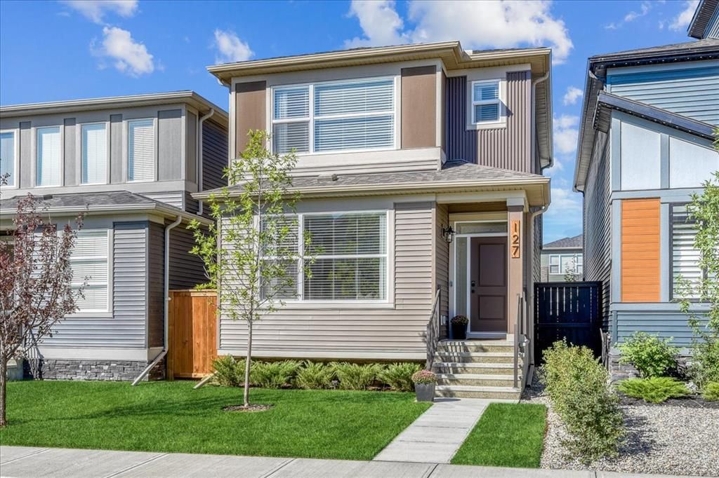 Main Photo: 127 Wolf Creek Manor SE in Calgary: C-281 Detached for sale : MLS®# A2002686