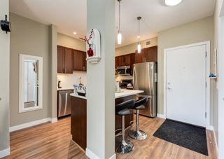 Photo 3: 210 16 Auburn Bay Link SE in Calgary: Auburn Bay Apartment for sale : MLS®# A2005034