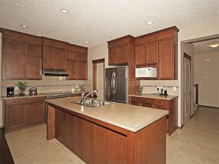 Photo 4: 349 PANORA Way NW in Calgary: Panorama Hills House for sale : MLS®# C4111343