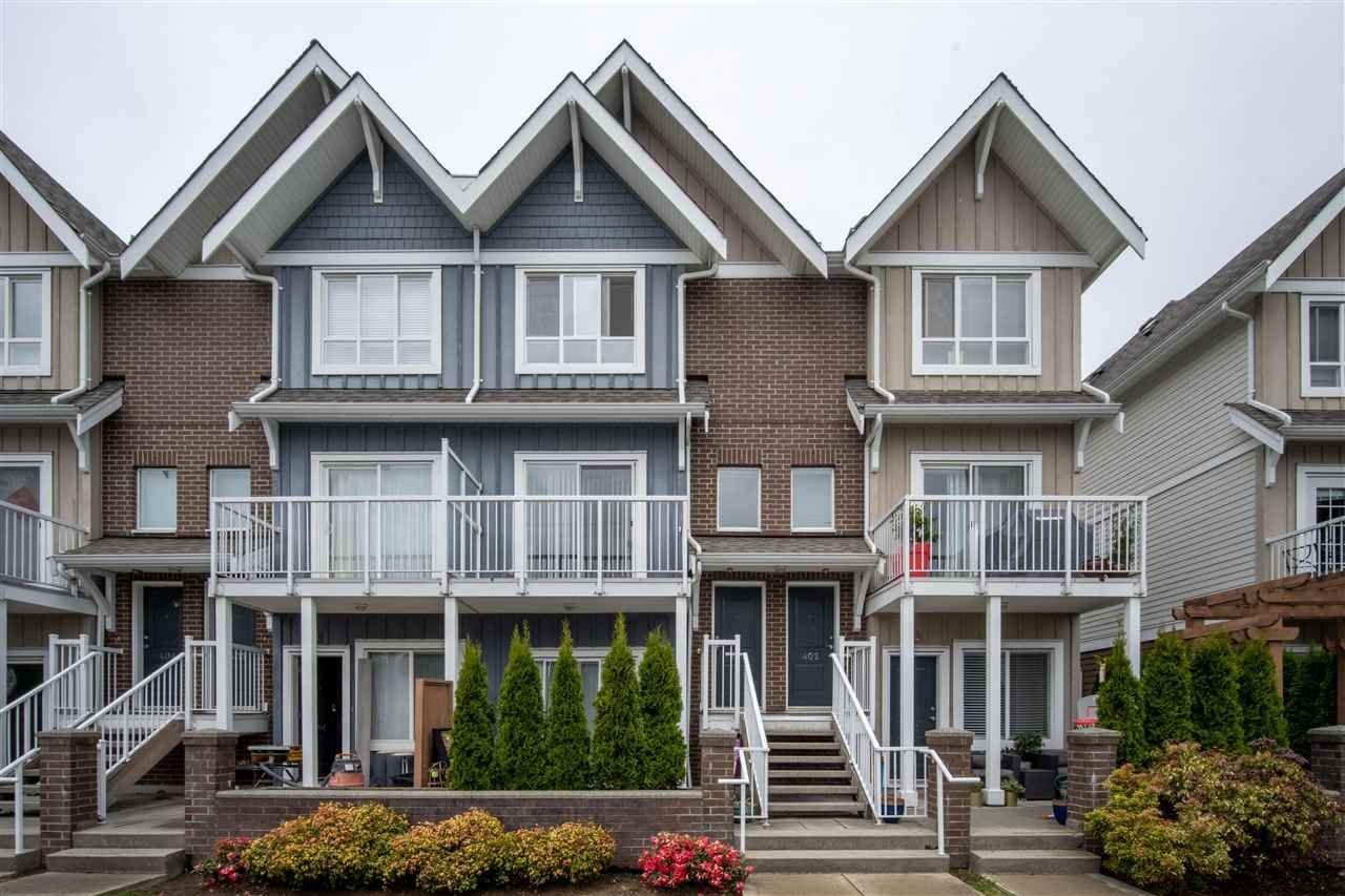 Main Photo: 402 1661 FRASER Avenue in Port Coquitlam: Glenwood PQ Townhouse for sale in "Brimley Mews" : MLS®# R2577428