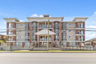 Main Photo: 406 19730 56 Avenue in Langley: Langley City Condo for sale : MLS®# R2882250