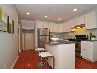 Photo 4: 102 5025 JOYCE Street in Vancouver: Collingwood VE Condo for sale in "GRAND STATION" (Vancouver East)  : MLS®# V904850
