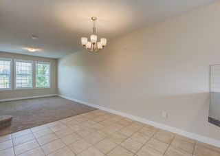 Photo 8: 59 Fireside Parkway: Cochrane Row/Townhouse for sale : MLS®# A2053037